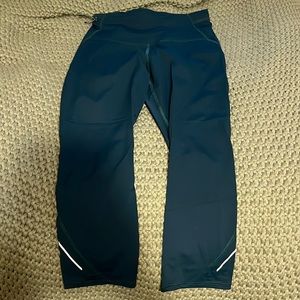 All in Motion.. dark green/blue high-waisted cropped leggings.